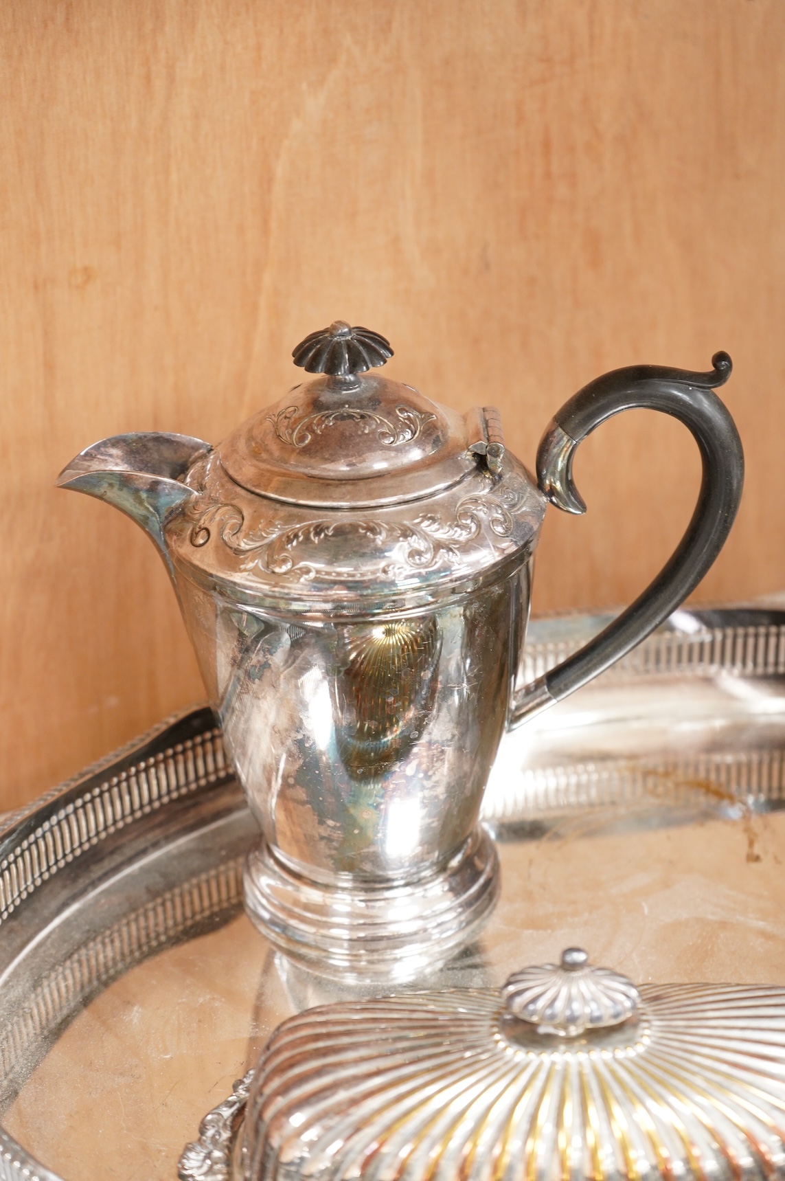 A quantity of plated wares to include a galleried tray, teapot, jug and bon bon dish with glass liner, largest 45cm wide